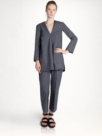 Expertly cut from crisply woven cotton, this structured tunic will instantly upgrade your wardrobe.V necklineInverted front pleatLong sleevesVented hemlineCottonDry cleanMade in ItalyModel shown is 5'10 (177cm) wearing US size 4. Expertly cut from crisply woven cotton, this structured tunic will instantly upgrade your wardrobe.V necklineInverted front pleatLong sleevesVented hemlineCottonDry cleanMade in ItalyModel shown is 5'10 (177cm) wearing US size 4.
