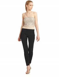 THE LOOKBeaded V-front spaghetti strapsStone embellishmentSide zipperBeaded back spaghetti straps with cutout detailsTHE FITAbout 19 from shoulder to hemTHE MATERIALViscoseFully linedCARE & ORIGINHand wash or dry cleanMade in ItalyModel shown is 5'10½ (179cm) wearing US size 2. THE LOOKBeaded V-front spaghetti strapsStone embellishmentSide zipperBeaded back spaghetti straps with cutout detailsTHE FITAbout 19 from shoulder to hemTHE MATERIALViscoseFully linedCARE & ORIGINHand wash or dry cleanMade in ItalyModel shown is 5'10½ (179cm) wearing US size 2.
