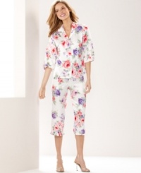 Snuggle up in a pretty springtime print. Morgan Taylor's ruffle top and pants pajama set features quarter-length sleeves and capri pants. Snuggle up in a pretty springtime print. Morgan Taylor's ruffle top and pants pajama set features quarter-length sleeves and capri pants.