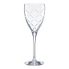 Diamond-shaped cuts delicately catch the light in these classic goblets from kate spade.