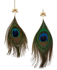 Flaunt your fashion sense with these peacock-inspired feather earrings from Betsey Johnson. Mismatched in varying sizes, they're accented with gold tone bows, crystal cup chain accents and green faux-feathers. Crafted in antiqued gold tone mixed metal. Approximate drop: 6 inches. Flaunt your fashion sense with these peacock-inspired feather earrings from Betsey Johnson. Mismatched in varying sizes, they're accented with gold tone bows, crystal cup chain accents and green faux-feathers. Crafted in antiqued gold tone mixed metal. Approximate drop: 6 inches.
