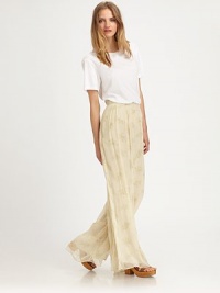 Whisperweight floral silk, tucked and pleated for a sophisticated shape.Wide waistbandFront pleatsWide legCenter back zipperRise, about 15Inseam, about 30SilkDry cleanMade in USA of imported fabricModel shown is 5'10 (177cm) wearing US size 4.