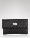 Marc Jacobs is known for its mix of sophistication with cool-girl allure. This leather clutch encapsulates the look with a night-right shape and tactile, quilted design.