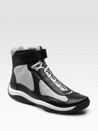 Leather and mesh with hook-and-tab ankle closure. Padded insole Rubber sole Imported Leather and mesh with hook-and-tab ankle closure. Padded insole Rubber sole Imported