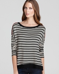 Neon piping pops on the shoulders of this Ella Moss boat neck tee, adding a little extra pizazz to the usual black and white. Neon piping pops on the shoulders of this Ella Moss boat neck tee, adding a little extra pizazz to the usual black and white.