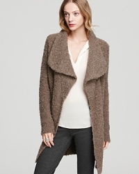 A romantic shawl-collar sweater coat is a versatile look for making a seamless and most stylish transition through the cooler months ahead. A romantic shawl-collar sweater coat is a versatile look for making a seamless and most stylish transition through the cooler months ahead.