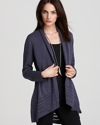 Sheer stripes inspire the angled silhouette of a whisper-weight Eileen Fisher cardigan for a bohemian-chic look.