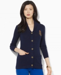 Heritage style comes to life in Lauren Ralph Lauren's chic shawl-collar petite cardigan, crafted from soft cotton and finished with an embroidered crest. Heritage style comes to life in Lauren Ralph Lauren's chic shawl-collar petite cardigan, crafted from soft cotton and finished with an embroidered crest.