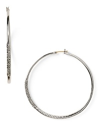 This pair of silvery hoop earrings from ABS by Allen Schwartz are a classic choice with a hint of glamour. Wear them to add subtle shimmer day to night. This pair of silvery hoop earrings from ABS by Allen Schwartz are a classic choice with a hint of glamour. Wear them to add subtle shimmer day to night.