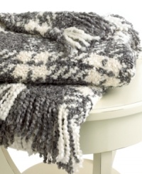 Beat the cold with this super-soft throw from Lauren Ralph Lauren. Features a boucle plaid knit in gray and cream hues for a cozy addition anywhere in your home. Finished with a 3 fringe. Beat the cold with this super-soft throw from Lauren Ralph Lauren. Features a boucle plaid knit in gray and cream hues for a cozy addition anywhere in your home. Finished with a 3 fringe.