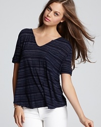 Featuring muted stripes, this Fresh Laundry tee drapes perfectly on the frame. Featuring muted stripes, this Fresh Laundry tee drapes perfectly on the frame.