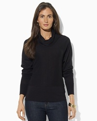 A chic cowl neckline and dolman sleeves modernize a sleek sweater, crafted in an ultra-soft cotton-modal blend. A chic cowl neckline and dolman sleeves modernize a sleek sweater, crafted in an ultra-soft cotton-modal blend.