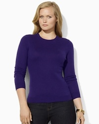 A lustrous silk-and-cashmere construction lends sultry appeal to a classic crewneck sweater. A lustrous silk-and-cashmere construction lends sultry appeal to a classic crewneck sweater.