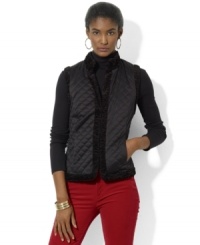 Lauren Ralph Lauren's luxurious quilted satin petite vest reverses to a plush faux-shearling side, doubling the glamorous wardrobe-styling options for the modern woman. Lauren Ralph Lauren's luxurious quilted satin petite vest reverses to a plush faux-shearling side, doubling the glamorous wardrobe-styling options for the modern woman.