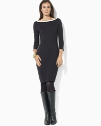 Polished zip openings with LRL-embossed snaps at the sleeves lend modern luxury to a color-blocked dress evoking the sleek glamour of the '60s.