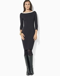 Polished zip openings with LRL-embossed snaps at the sleeves lend modern luxury to a color-blocked dress evoking the sleek glamour of the '60s. Polished zip openings with LRL-embossed snaps at the sleeves lend modern luxury to a color-blocked dress evoking the sleek glamour of the '60s.