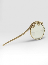 Textured brass gecko holds fast to a smooth brass-encircled magnifying glass.Ruby Swarovski crystal eyes24 kt goldplate finish7 longImported Textured brass gecko holds fast to a smooth brass-encircled magnifying glass.Ruby Swarovski crystal eyes24 kt goldplate finish7 longImported