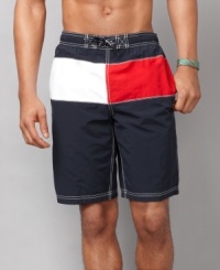 Show your true colors. These Tommy Hilfiger swim trunks are all-American cool. Show your true colors. These Tommy Hilfiger swim trunks are all-American cool.