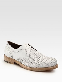 Modern update on a dress classic, stylishly woven in Italian calfskin leather.Leather upperLeather liningPadded insoleLeather soleMade in Italy Modern update on a dress classic, stylishly woven in Italian calfskin leather.Leather upperLeather liningPadded insoleLeather soleMade in Italy