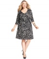 Look sensational and slender with Elementz' three-quarter sleeve plus size dress, featuring a slimming panel inset and an A-line shape.