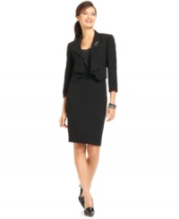 Menswear-inspired fabric gets a modern makeover from Tahari by ASL. The soft, cascading collar and petite skirt meld the power of pinstripes with a feminine silhouette. Menswear-inspired fabric gets a modern makeover from Tahari by ASL. The soft, cascading collar and petite skirt meld the power of pinstripes with a feminine silhouette.