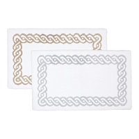 A classic trellis border frames this plush, super soft cotton bath rug. A classic trellis border frames this plush, super soft cotton bath rug.