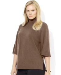 A classic knit turtleneck is crafted with chic three-quarter length sleeves in a kimono silhouette for ease of movement and elegance. A classic knit turtleneck is crafted with chic three-quarter length sleeves in a kimono silhouette for ease of movement and elegance.