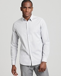 Subtle pale blue stripes add a stylish accent to a slim fit button down by Theory. Subtle pale blue stripes add a stylish accent to a slim fit button down by Theory.