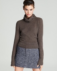 Blustery weather calls for the plush warmth of an Aqua Cashmere turtleneck sweater and this staple style with exposed seams teams with streamlined separates for an always-winning combination. Blustery weather calls for the plush warmth of an Aqua Cashmere turtleneck sweater and this staple style with exposed seams teams with streamlined separates for an always-winning combination.