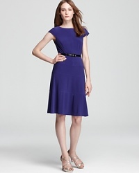 A swing skirt lends a ladylike look to this belted Anne Klein dress. A swing skirt lends a ladylike look to this belted Anne Klein dress.