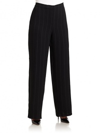THE LOOKNarrow waistband with concealed hook-and-eye and interior button tabFront zipperWide-leg silhouetteUnfinished hemTHE FITRise, about 12Inseam, about 35THE MATERIAL63% triacetate/37% polyesterCARE & ORIGINDry cleanImported THE LOOKNarrow waistband with concealed hook-and-eye and interior button tabFront zipperWide-leg silhouetteUnfinished hemTHE FITRise, about 12Inseam, about 35THE MATERIAL63% triacetate/37% polyesterCARE & ORIGINDry cleanImported