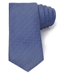 A reserved tie in pure silk says you mean business and complements your dress shirting for a look of classic distinction. A reserved tie in pure silk says you mean business and complements your dress shirting for a look of classic distinction.
