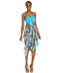Cha Cha Vente's so-summery dress features a cute smocked bodice and a printed skirt with handkerchief hem for breezy, bohemian style. Cha Cha Vente's so-summery dress features a cute smocked bodice and a printed skirt with handkerchief hem for breezy, bohemian style.