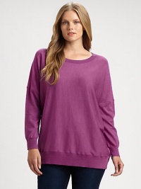 Made from merino wool and featuring classic ribbed trim, this sweater is a must-wear this season. Pair this relaxed-fit top with slim pants. Round neckLong sleevesRibbed trimPull-on styleAbout 28 from shoulder to hemMerino woolDry cleanImported of Italian fabric Made from merino wool and featuring classic ribbed trim, this sweater is a must-wear this season. Pair this relaxed-fit top with slim pants. Round neckLong sleevesRibbed trimPull-on styleAbout 28 from shoulder to hemMerino woolDry cleanImported of Italian fabric