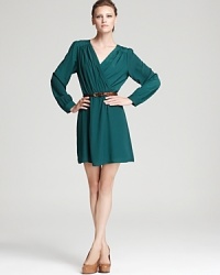 A most flattering silhouette, this Aqua dress is cut with a crossover neckline and cinched waist to flaunt your gorgeous assets when you're working it at the office. A most flattering silhouette, this Aqua dress is cut with a crossover neckline and cinched waist to flaunt your gorgeous assets when you're working it at the office.