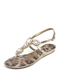 Luxe jewels rest atop snakeskin embossed leather on these Sam Edelman sandals, a glam style with laid-back practicality. Luxe jewels rest atop snakeskin embossed leather on these Sam Edelman sandals, a glam style with laid-back practicality.