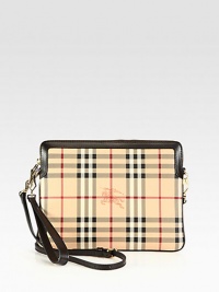 An ultra-protective iPad® case featuring the iconic Burberry check with rich leather trim. Adjustable detachable leather shoulder strap, 20-23 dropDetachable leather wristlet strap, 9 dropTop zip closureOne inside open pocketCotton lining10½W X 8H X 1½DImportedPlease note: iPad® not included.