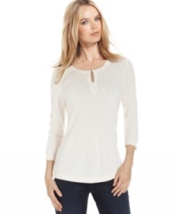Debbie Morgan's ultra-soft sweater features tonal beads at the chest for a glimmering touch of sparkle. Debbie Morgan's ultra-soft sweater features tonal beads at the chest for a glimmering touch of sparkle.