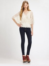Dreamy floral lace skims the body in a comely blouson silhouette with full bell sleeves.Surplice necklineDropped shouldersThree-quarter bell sleevesSet-in waistAbout 23 from shoulder to hem57% cotton/43% nylonHand washImportedModel shown is 5'10 (177cm) wearing US size Small. Dreamy floral lace skims the body in a comely blouson silhouette with full bell sleeves.Surplice necklineDropped shouldersThree-quarter bell sleevesSet-in waistAbout 23 from shoulder to hem57% cotton/43% nylonHand washImportedModel shown is 5'10 (177cm) wearing US size Small.