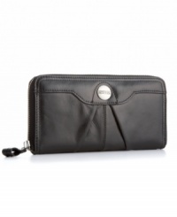 A simple leather wallet with plenty of organizational pockets and zip around closure from Kenneth Cole Reaction. A simple leather wallet with plenty of organizational pockets and zip around closure from Kenneth Cole Reaction.