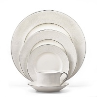 Ivory Trellis draws upon a universal labryrinth-like symbol of continuity, stability, and eternity. The subtle tonal pattern rimmed with a solid platinum line forms a captivating border on a white-based bone china plate. Ivory Trellis draws upon a universal labryrinth-like symbol of continuity, stability, and eternity. The subtle tonal pattern rimmed with a solid platinum line forms a captivating border on a white-based bone china plate.