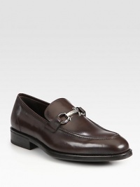 Hickory calfskin loafer with iconic gancini ornament and comfortable rubber sole.Leather upperLeather liningPadded insoleRubber soleMade in Italy Hickory calfskin loafer with iconic gancini ornament and comfortable rubber sole.Leather upperLeather liningPadded insoleRubber soleMade in Italy