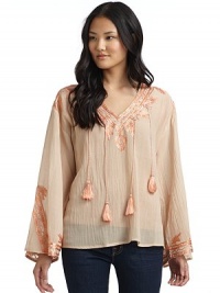 THE LOOKSheer crinkle designV-neckLong wide sleevesContrast silk embroideryDangling tassel detailsTHE FITAbout 23 from shoulder to hemTHE MATERIAL55% cotton/45% silkEmbroidery: silkCARE & ORIGINDry cleanImportedModel shown is 5'10 (177cm) wearing US size Small. THE LOOKSheer crinkle designV-neckLong wide sleevesContrast silk embroideryDangling tassel detailsTHE FITAbout 23 from shoulder to hemTHE MATERIAL55% cotton/45% silkEmbroidery: silkCARE & ORIGINDry cleanImportedModel shown is 5'10 (177cm) wearing US size Small.