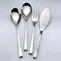 Nicola Flatware by Couzon features a heavy weight and contemporary curves for the modern table. The signature offset knife blade feels very natural in the hand. Perfectly balanced, superior 18/10 quality. Nicola Flatware by Couzon features a heavy weight and contemporary curves for the modern table. The signature offset knife blade feels very natural in the hand. Perfectly balanced, superior 18/10 quality.