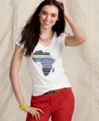 Look good while doing good! This graphic Tommy Hilfiger tee is part of a collection that is inspired by and benefits African communities. Look good while doing good! This graphic Tommy Hilfiger tee is part of a collection that is inspired by and benefits African communities.