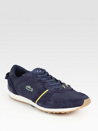 Sporty and sleek, rendered in nylon, suede and leather with signature embroidered logo on side panel.Nylon, suede and leather upperPadded insoleRubber soleImported Sporty and sleek, rendered in nylon, suede and leather with signature embroidered logo on side panel.Nylon, suede and leather upperPadded insoleRubber soleImported