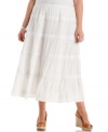 Add an airy feel to your spring/summer wardrobe with JM Collection's plus size maxi skirt, featuring a tiered design.
