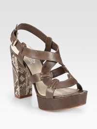Smooth leather straps intertwine, finishing with an adjustable ankle strap and a primal snake-print leather heel. Snake-print leather heel, 5 (125mm)Covered platform, 1 (25mm)Compares to a 4 heel (100mm)Leather upperLeather lining and solePadded insoleImported Smooth leather straps intertwine, finishing with an adjustable ankle strap and a primal snake-print leather heel. Snake-print leather heel, 5 (125mm)Covered platform, 1 (25mm)Compares to a 4 heel (100mm)Leather upperLeather lining and solePadded insoleImported