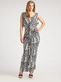 The epitome of flattering, this traffic-stopping design will accentuate your figure, thanks to a deep neckline and twist-front, ruched waist details.Draped, v-necklineSleevelessTwist-front, ruched waistAbout 45 from natural waist94% venezia/6% spandexDry cleanMade in USA The epitome of flattering, this traffic-stopping design will accentuate your figure, thanks to a deep neckline and twist-front, ruched waist details.Draped, v-necklineSleevelessTwist-front, ruched waistAbout 45 from natural waist94% venezia/6% spandexDry cleanMade in USA