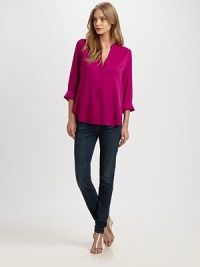 Airy silk georgette elevates this wardrobe staple, crafted in an easy pullover style.Band collarHalf placketShirttail hemBack box pleatAbout 28 from shoulder to hem95% silk/5% spandexDry cleanImportedModel shown is 5'11 (180cm) wearing US size 2. Airy silk georgette elevates this wardrobe staple, crafted in an easy pullover style.Band collarHalf placketShirttail hemBack box pleatAbout 28 from shoulder to hem95% silk/5% spandexDry cleanImportedModel shown is 5'11 (180cm) wearing US size 2.